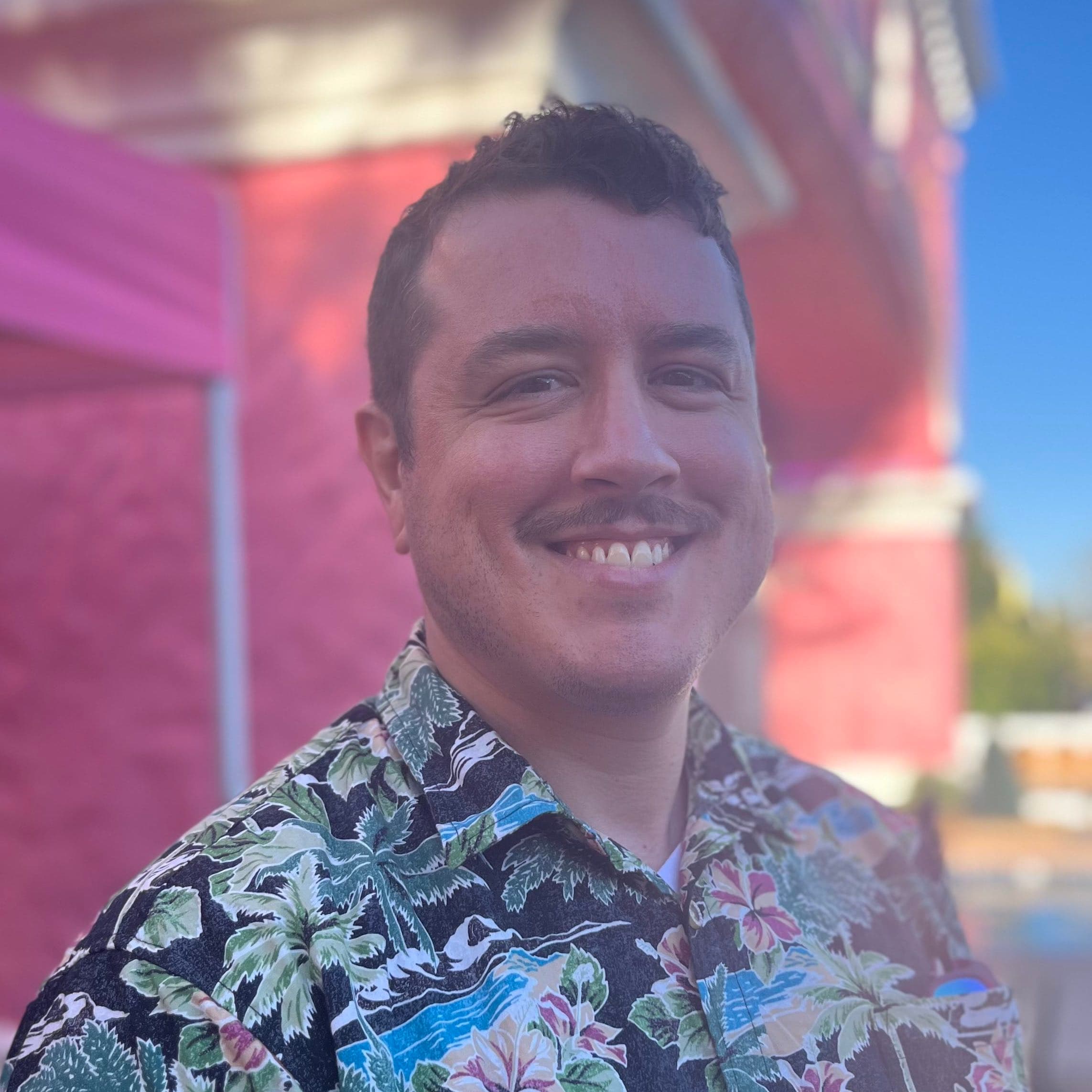 Picture of Jon standing in front of Casa Bonita